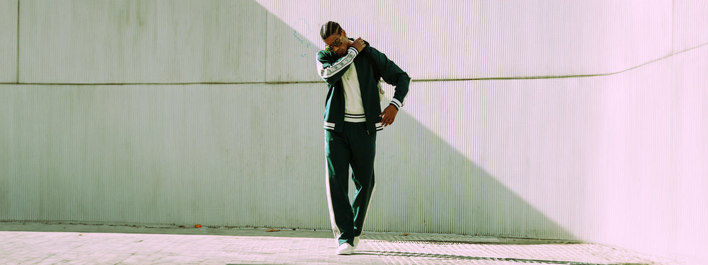 SikSilk End of season sale, up to 70% off. Model posing in SikSilk Tracksuit