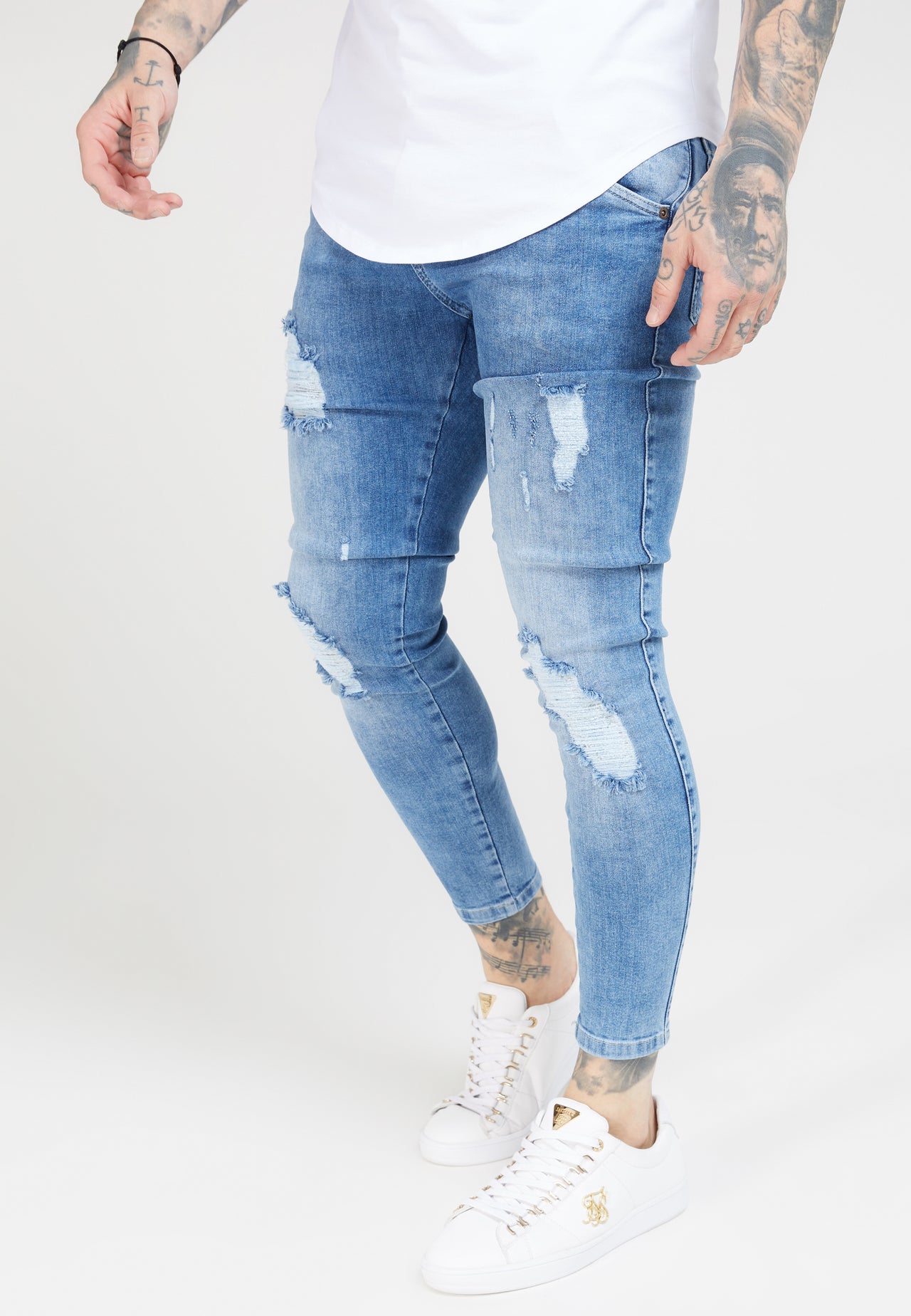 Blue Mid Wash Essential Distressed Skinny Jean