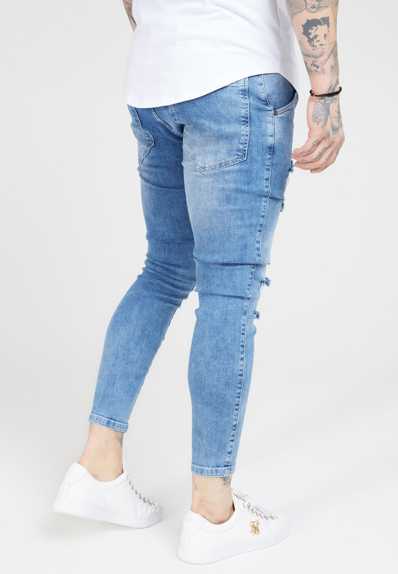 Blue Mid Wash Essential Distressed Skinny Jean (1)