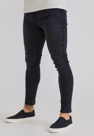 Schwarze Skinny Jeans