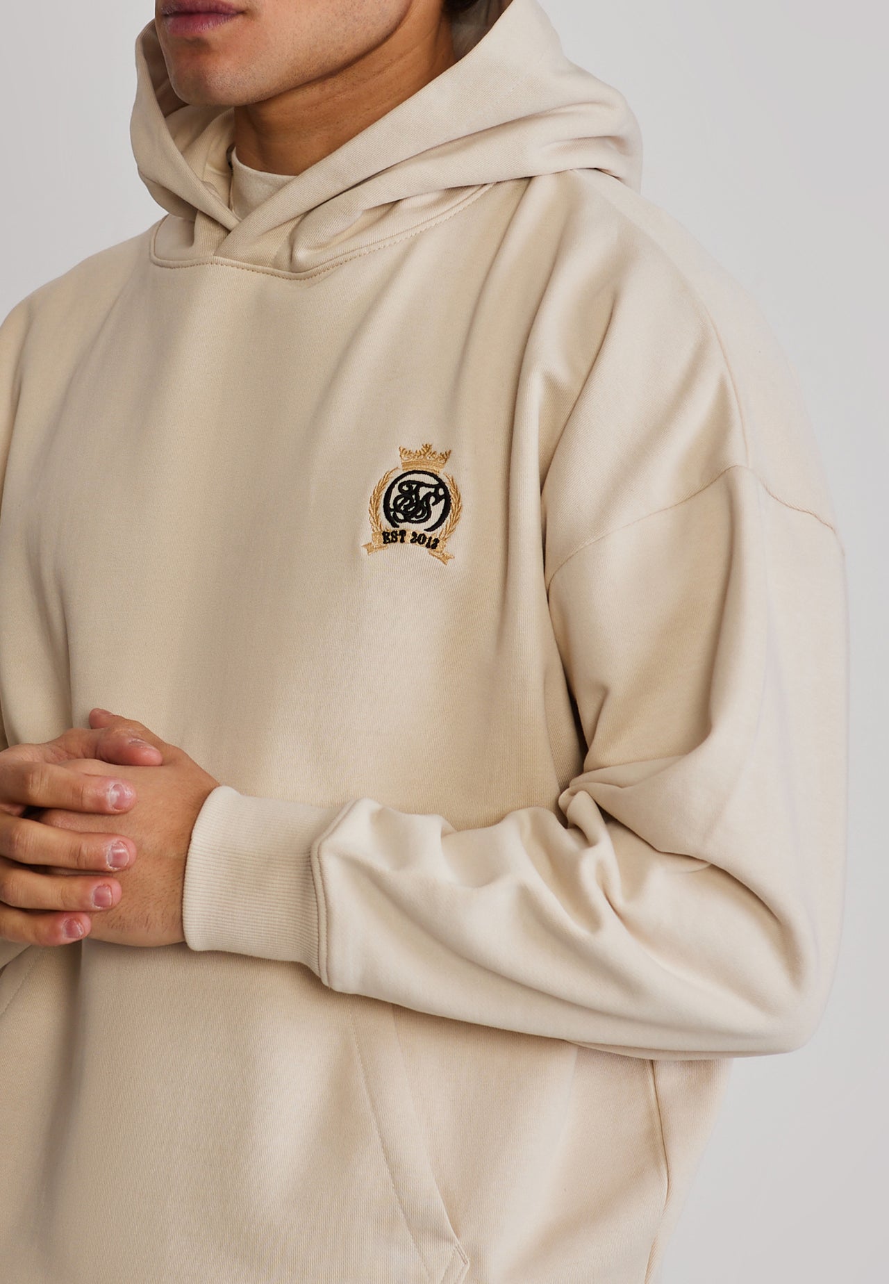 Ecru Crest Hoodie (1)