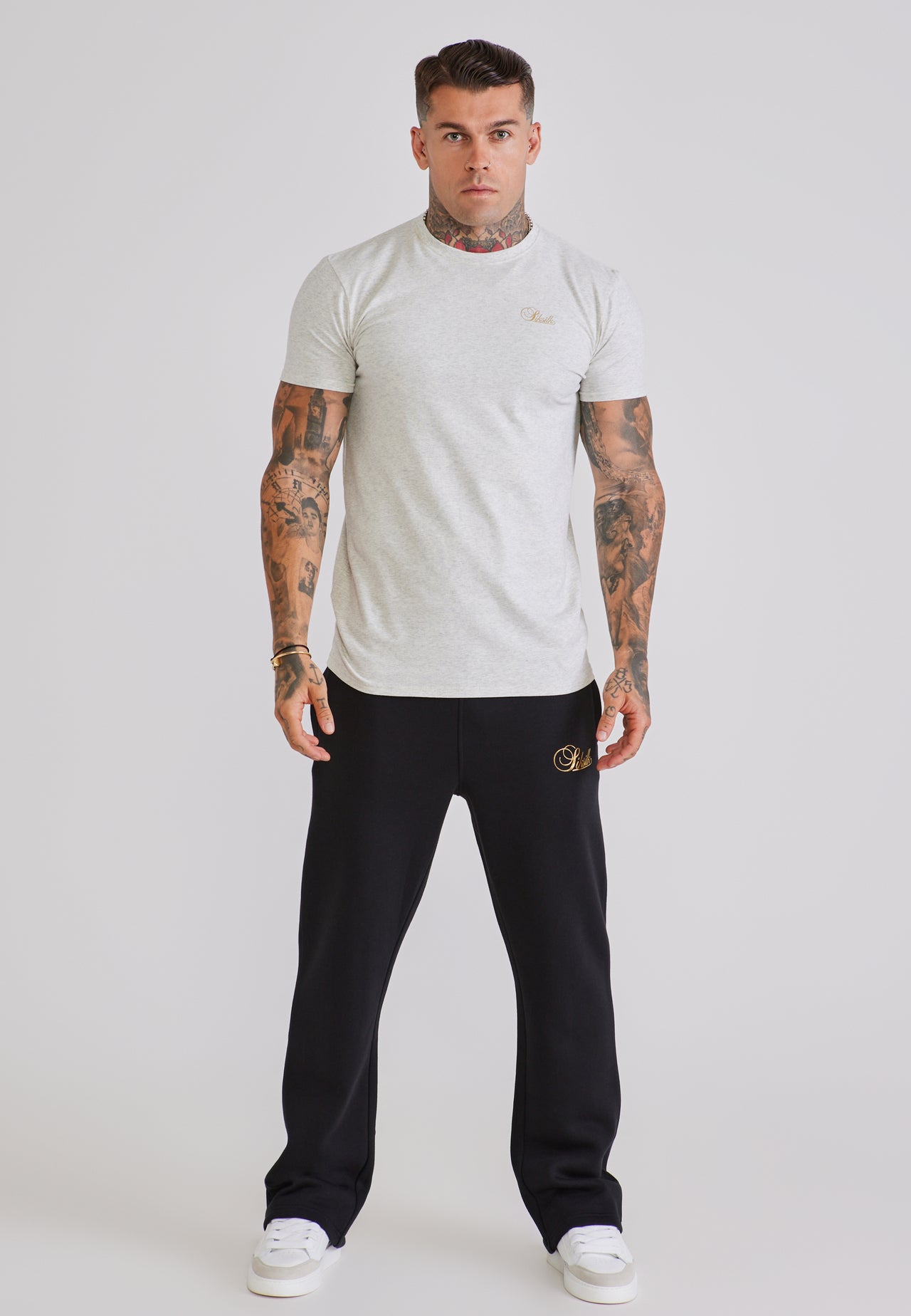 Black and Gold Essentials Track Pants (1)