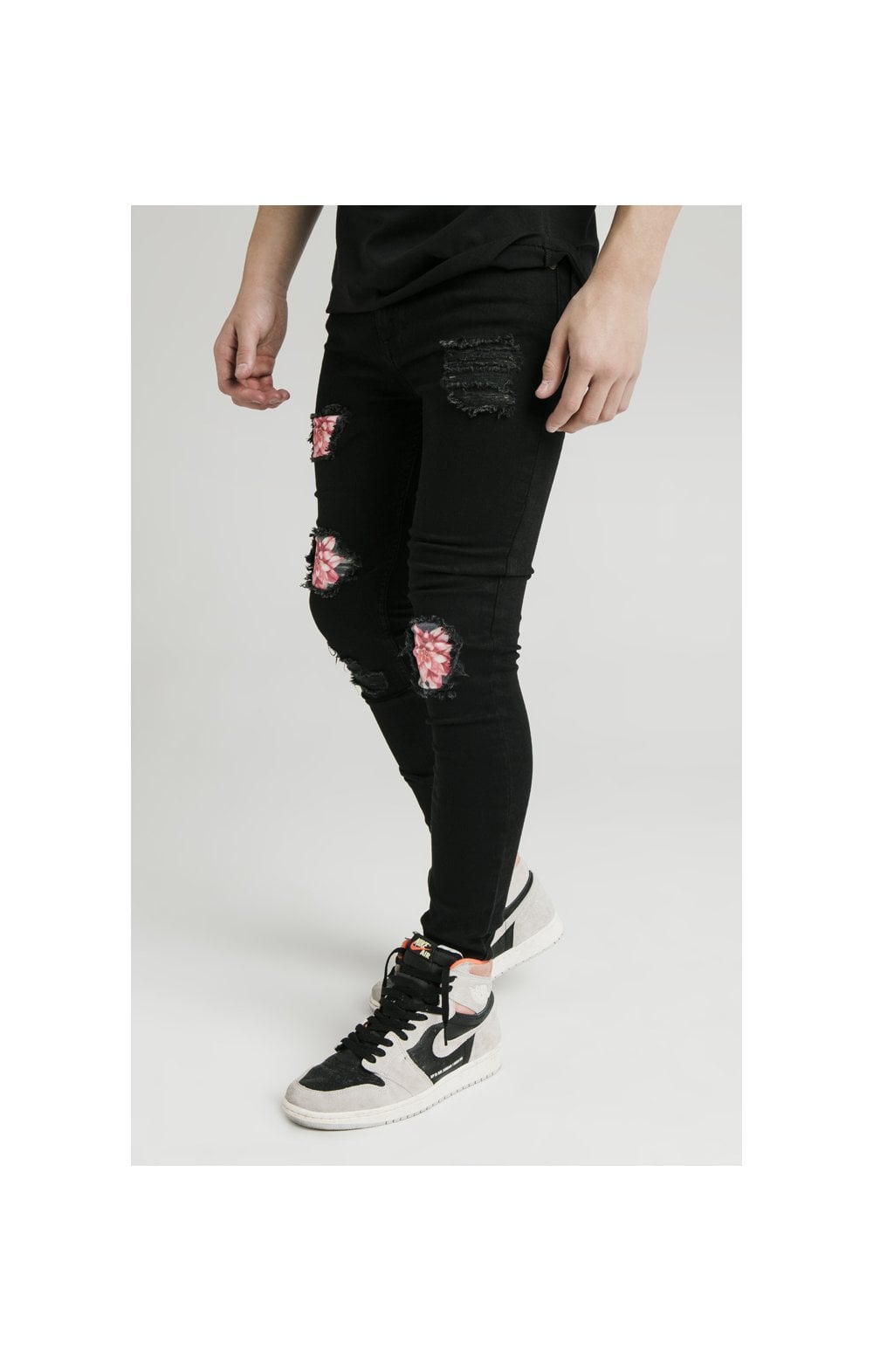 Load image into Gallery viewer, Illusive London Distressed Floral Patch Jeans - Black &amp; Floral