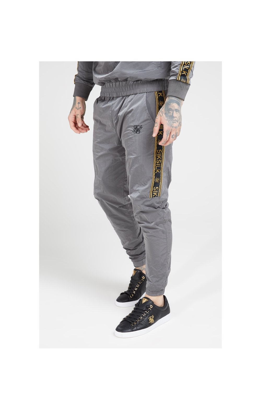 Load image into Gallery viewer, SikSilk Crushed Nylon Taped Joggers – Grey &amp; Gold