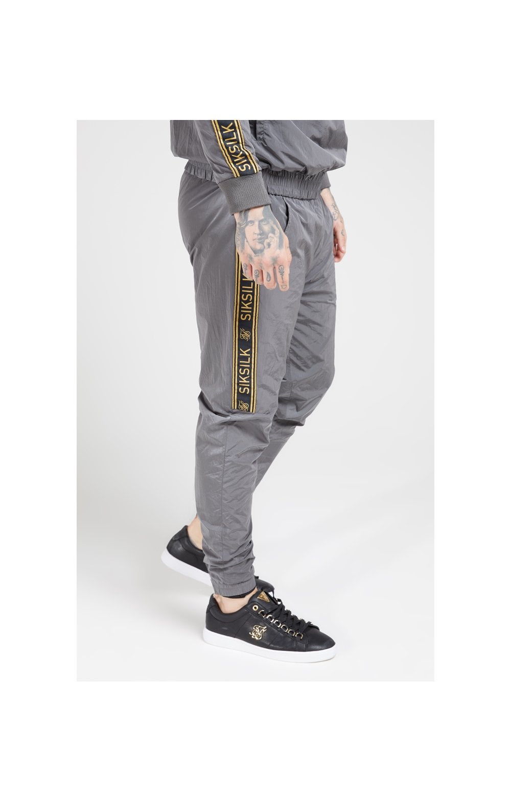 Load image into Gallery viewer, SikSilk Crushed Nylon Taped Joggers – Grey &amp; Gold (1)