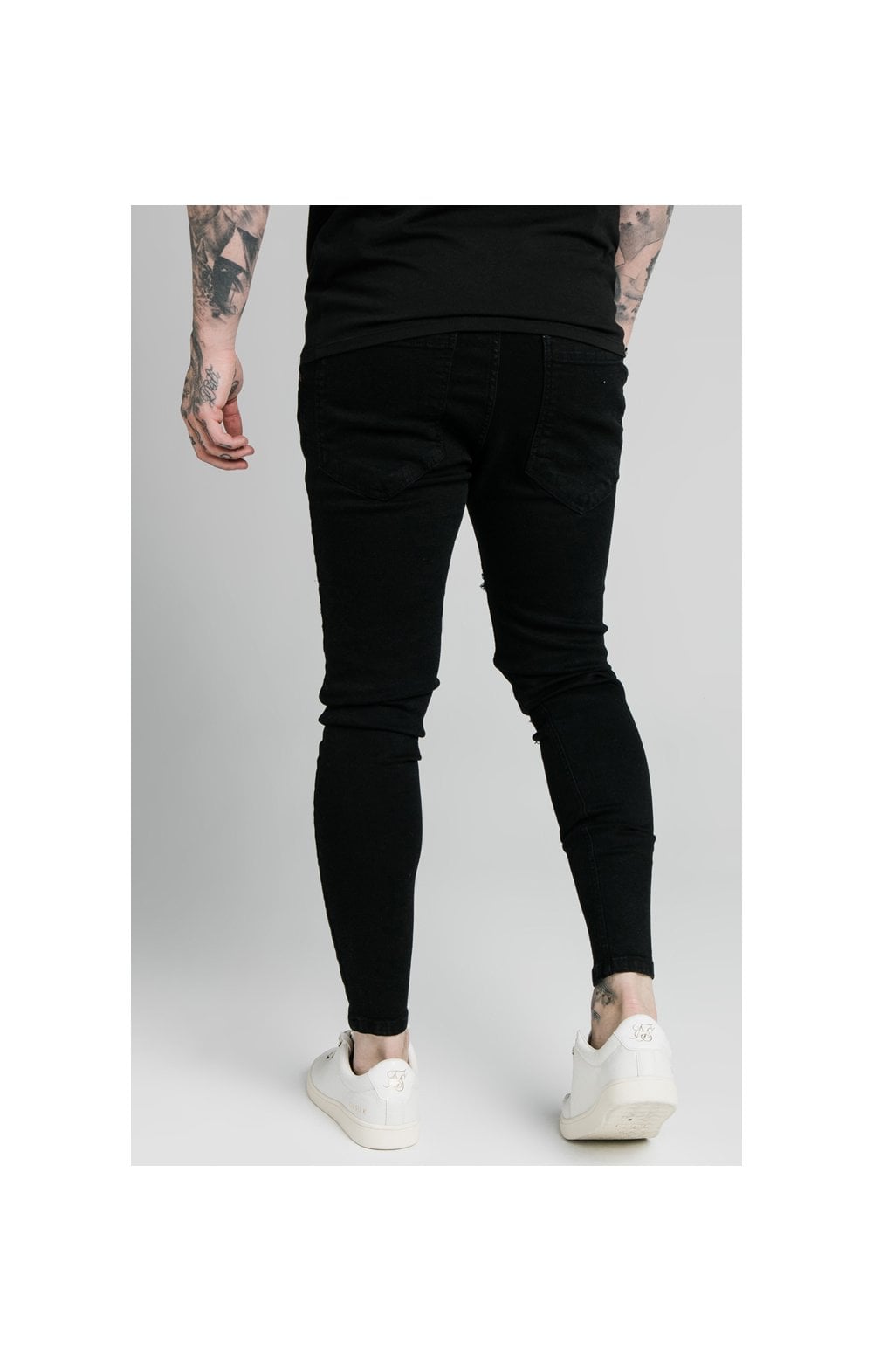 Sik silk best sale black skinny jeans