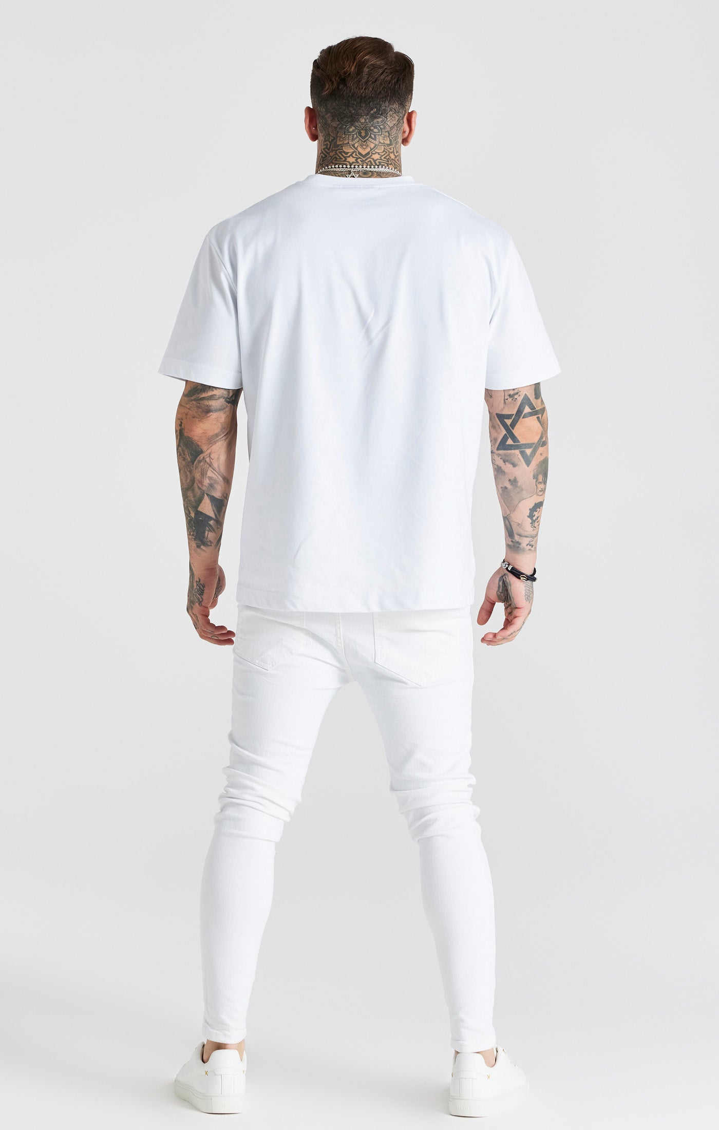 Load image into Gallery viewer, White Essential Distressed Skinny Jean (4)