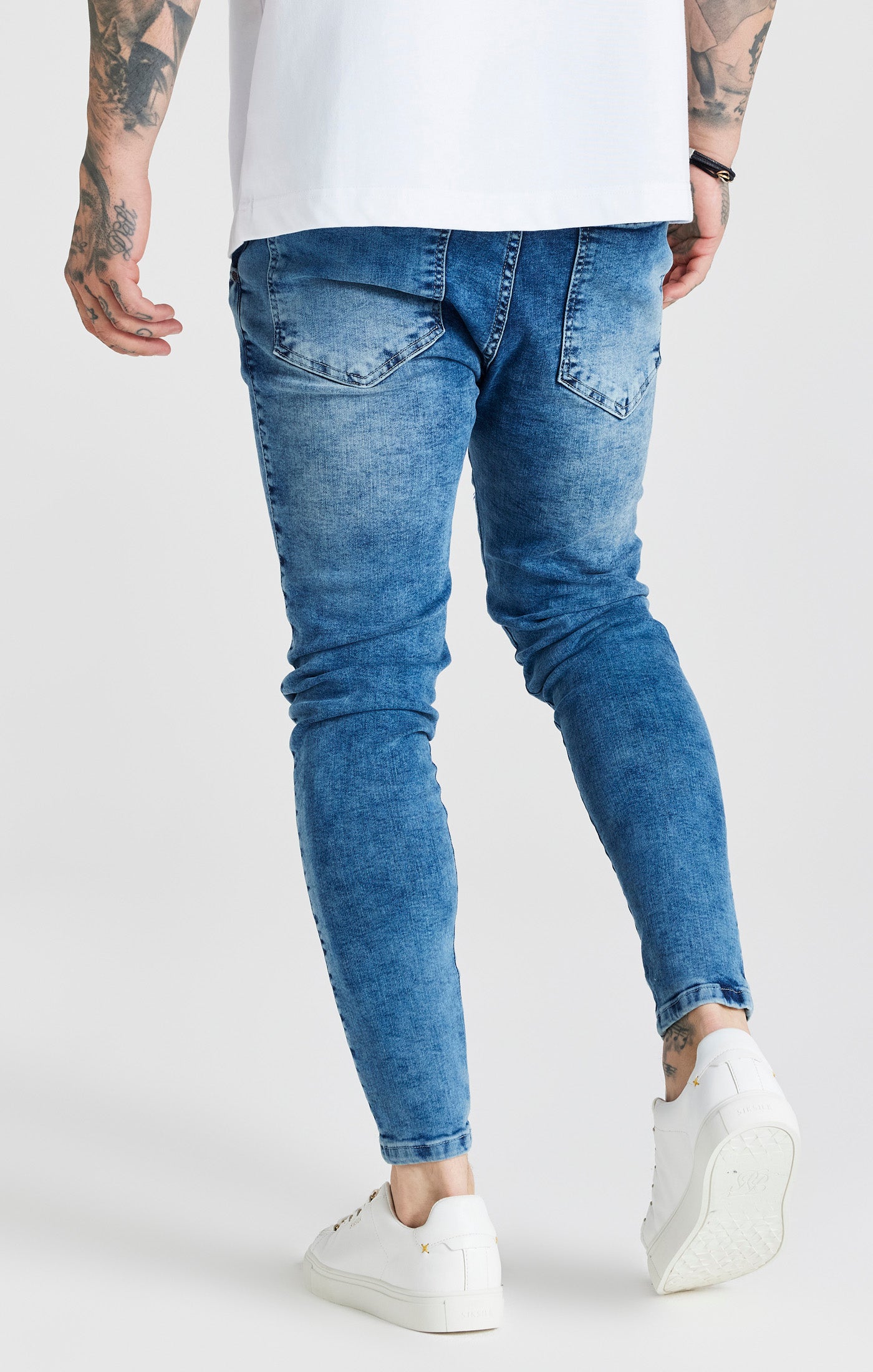 Load image into Gallery viewer, Blue Mid Wash Essential Distressed Skinny Jean (3)