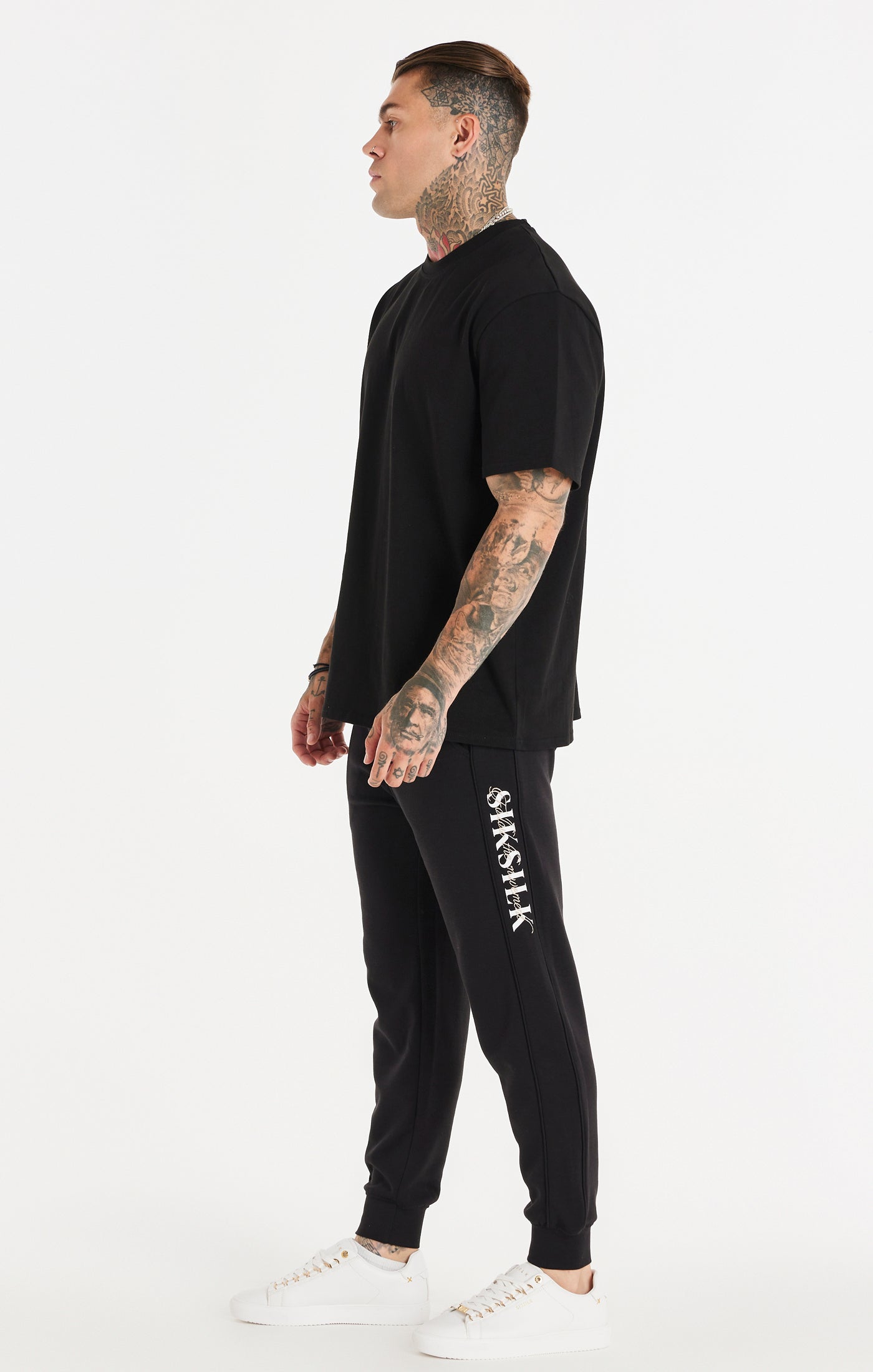 Load image into Gallery viewer, Black Script Logo Panelled Trousers (5)