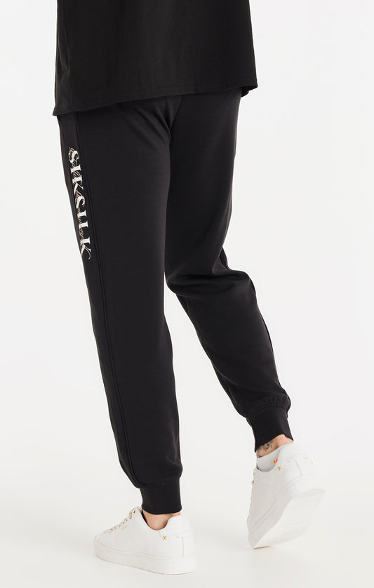 Black Script Logo Panelled Trousers