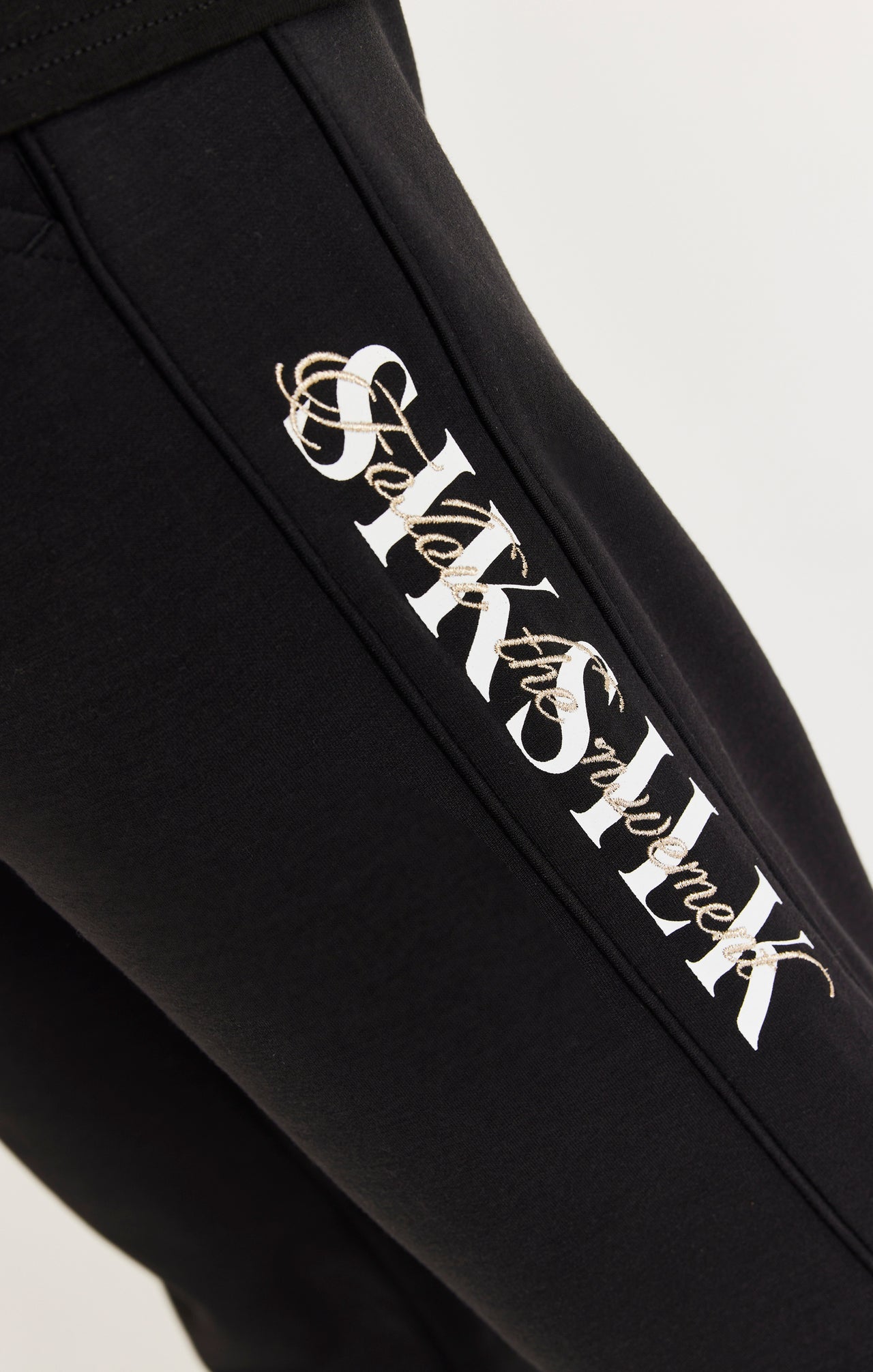 Black Script Logo Panelled Trousers (1)