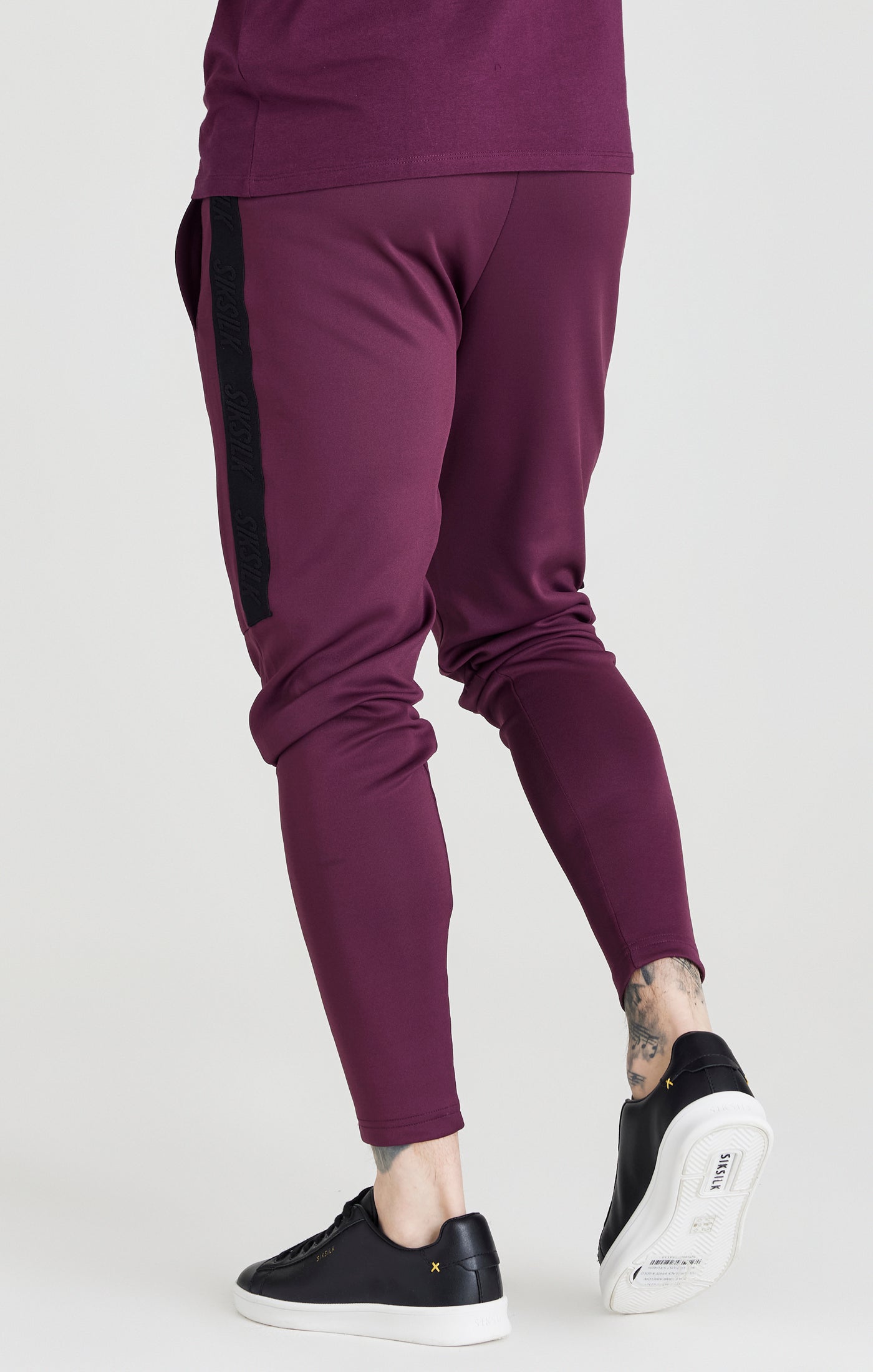 Load image into Gallery viewer, SikSilk Taped Athlete Loose Fit Pant - Burgundy &amp; Black (1)