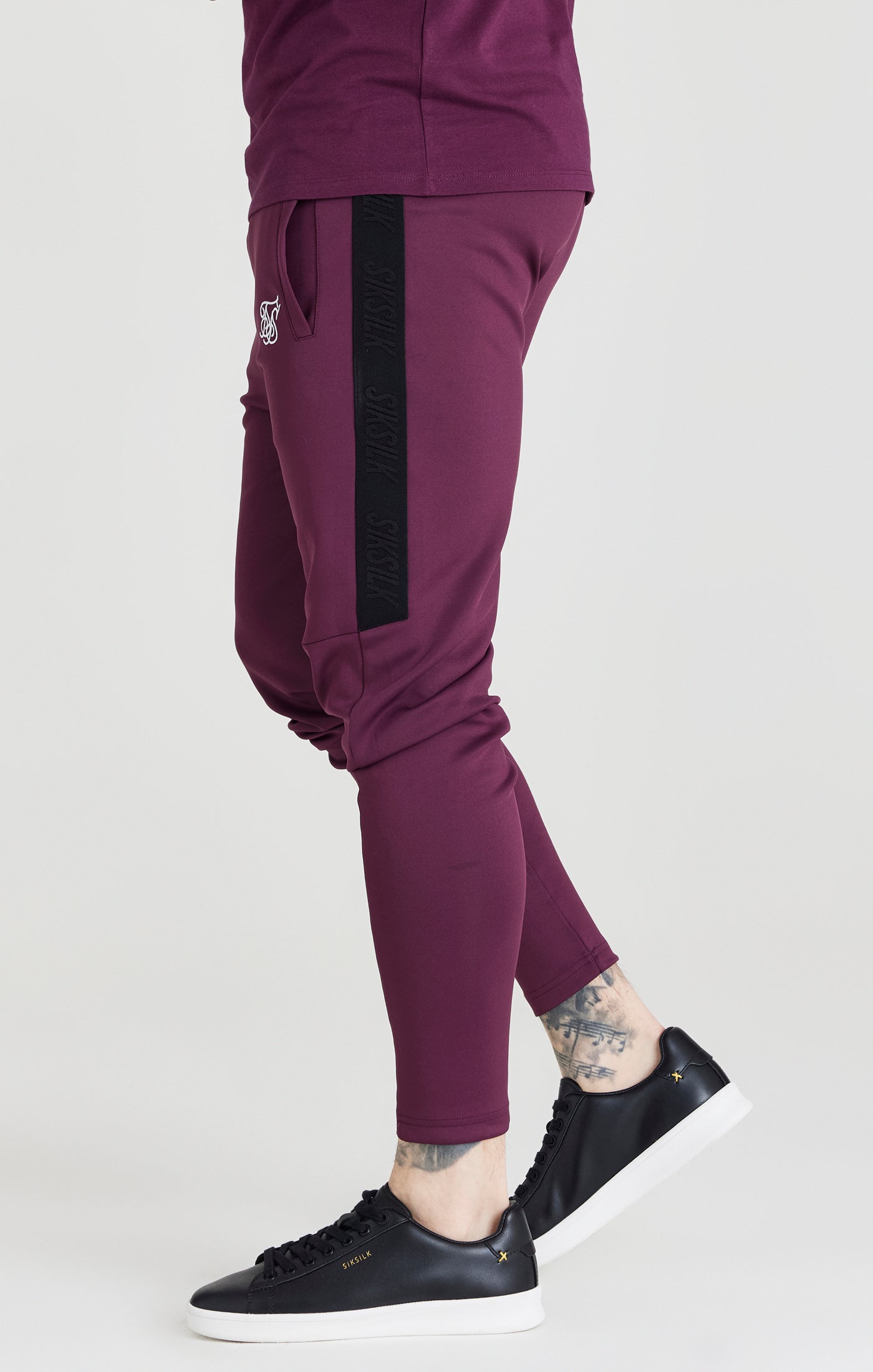 Load image into Gallery viewer, SikSilk Taped Athlete Loose Fit Pant - Burgundy &amp; Black (2)