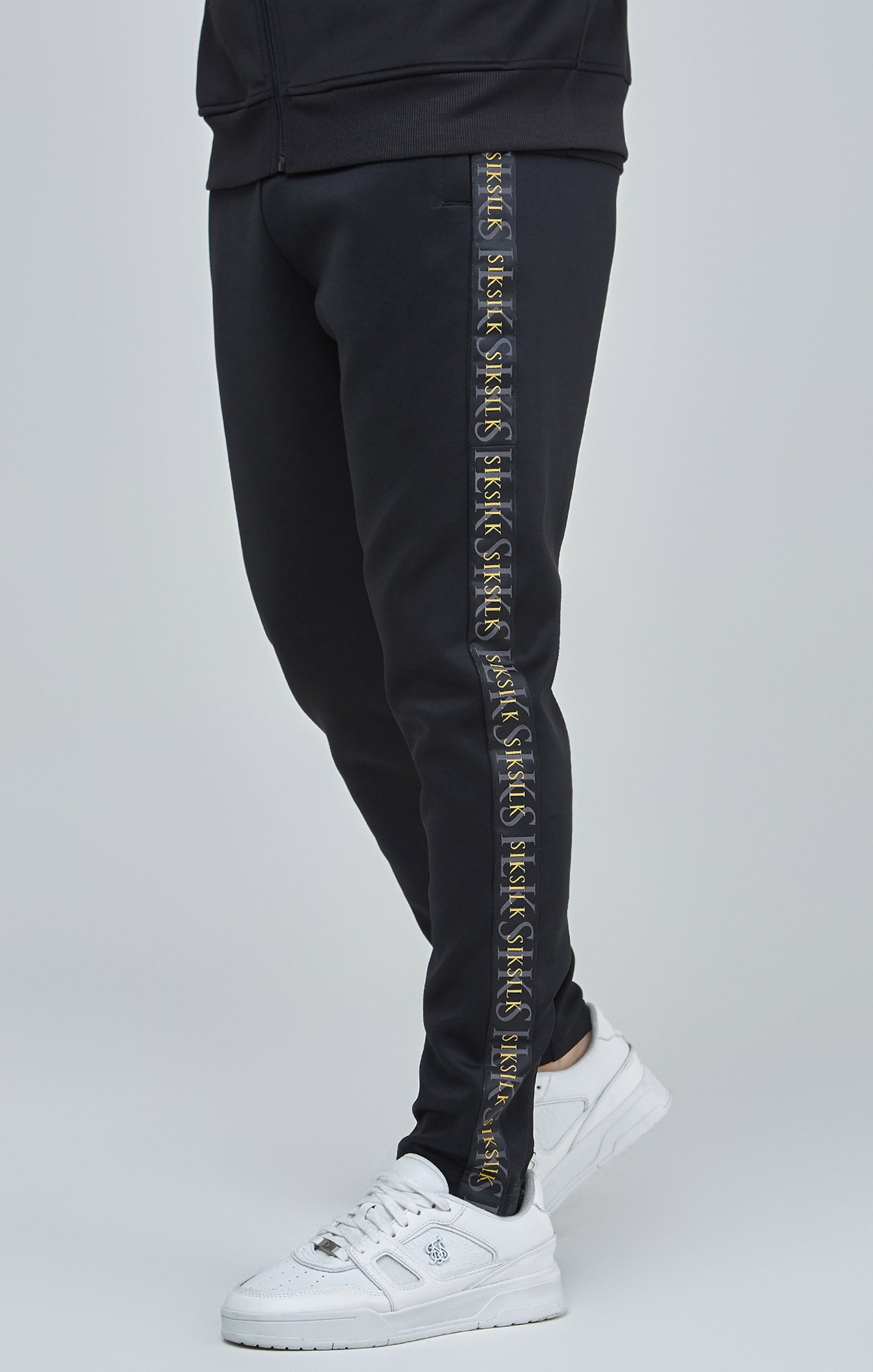 Gold best sale track pants