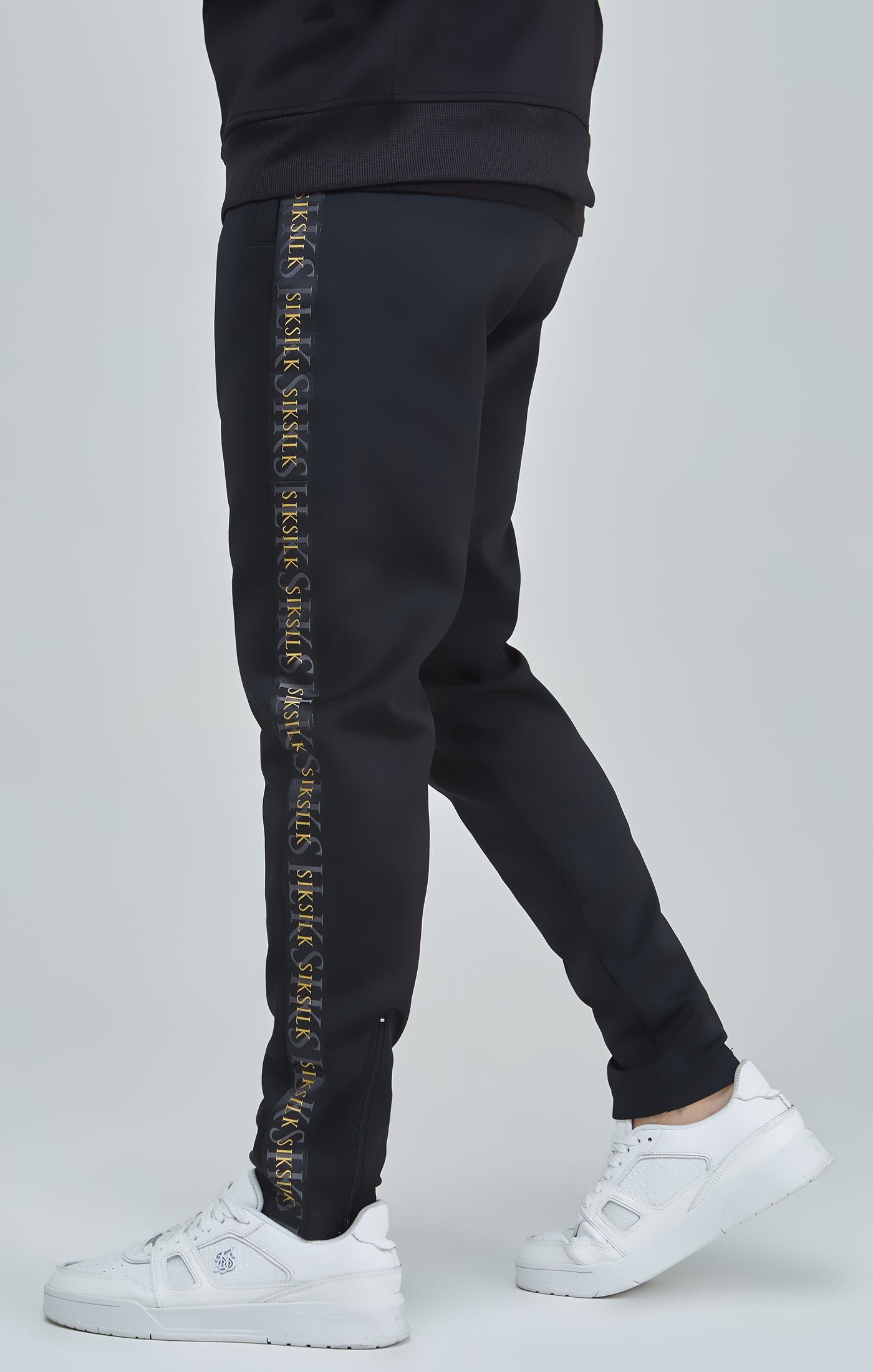 Black and best sale gold track pants