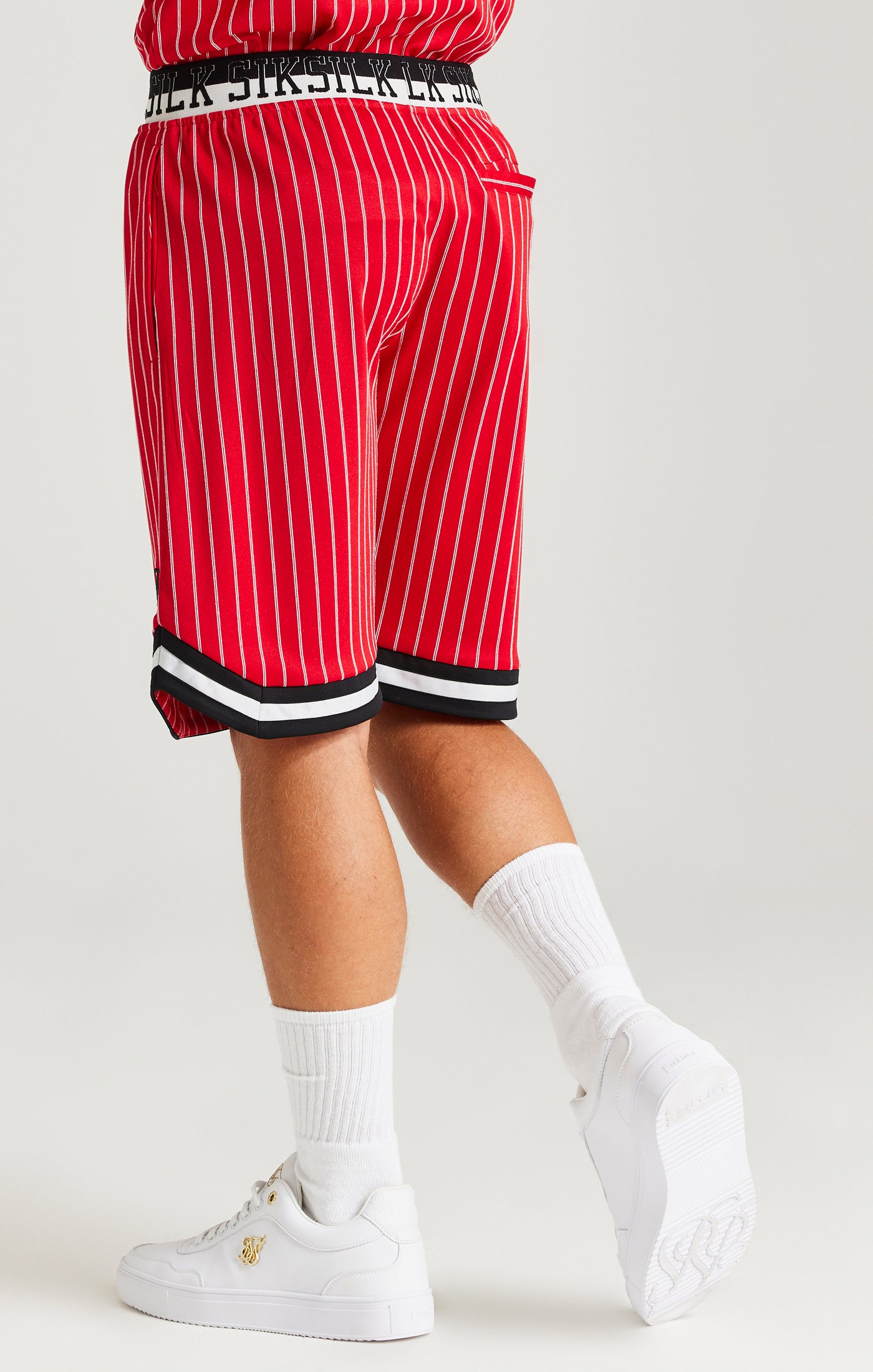 red and white striped basketball shorts